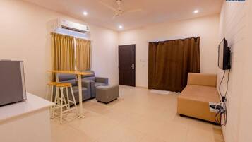 Premium Duplex | Living area | 32-inch LCD TV with cable channels
