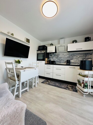 Comfortable vacation rental with private terrace & Wi-Fi near Lake Sorpe—Haus am Krähenbach—Sorpe