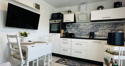 Comfortable vacation rental with private terrace & Wi-Fi near Lake Sorpe—Haus am Krähenbach—Sorpe