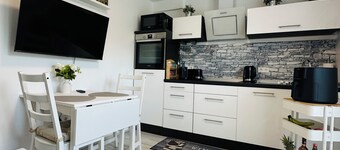Comfortable vacation rental with private terrace & Wi-Fi near Lake Sorpe—Haus am Krähenbach—Sorpe