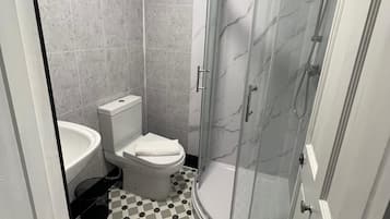 Shower, free toiletries, towels, soap