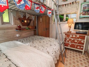 A bedroom with a bed, a dresser, a map on the wall, and a ladder. - Cool Cabin (Leek)