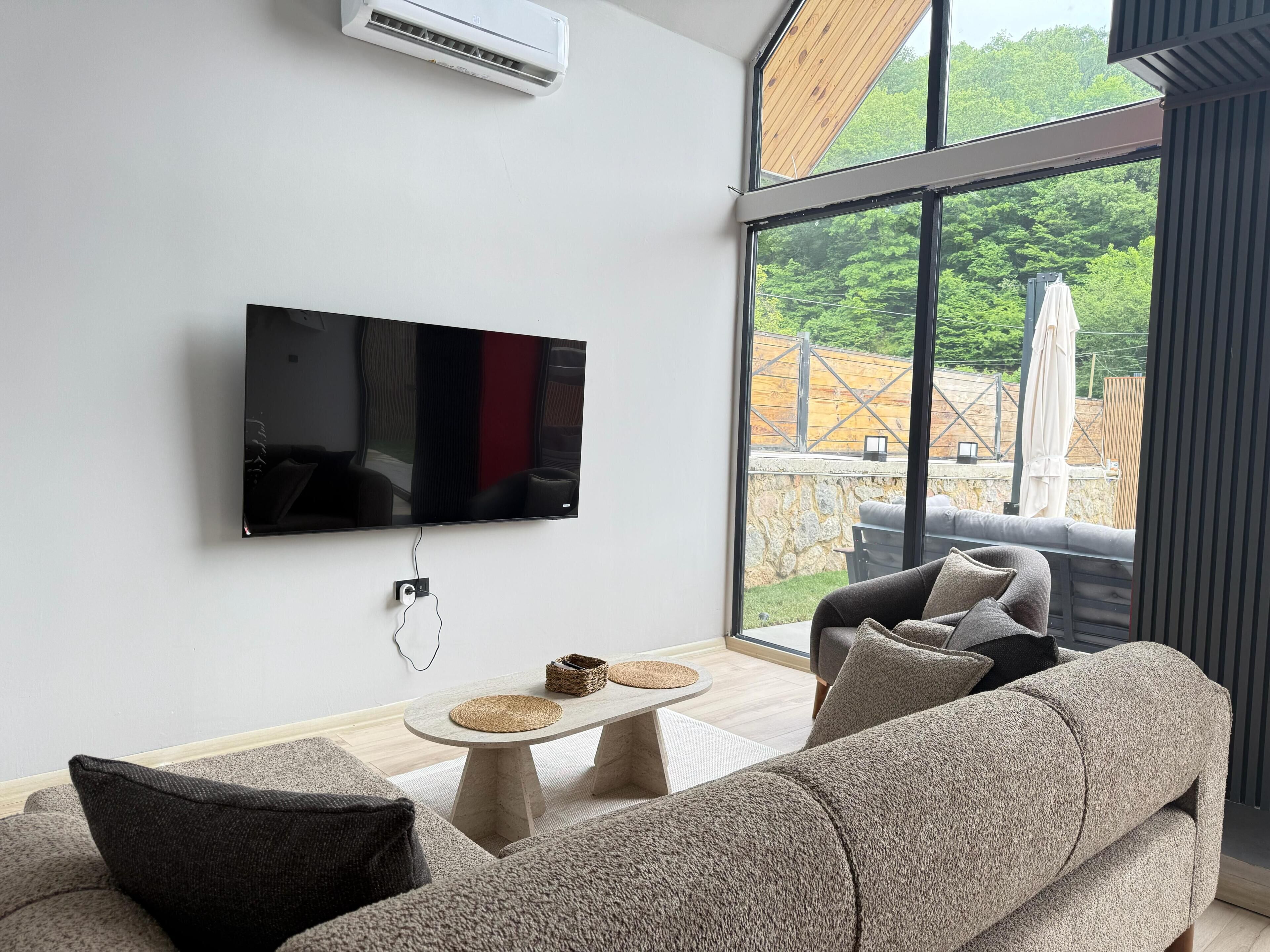 Design-Bungalow, eigener Pool, Gartenblick | Wohnbereich