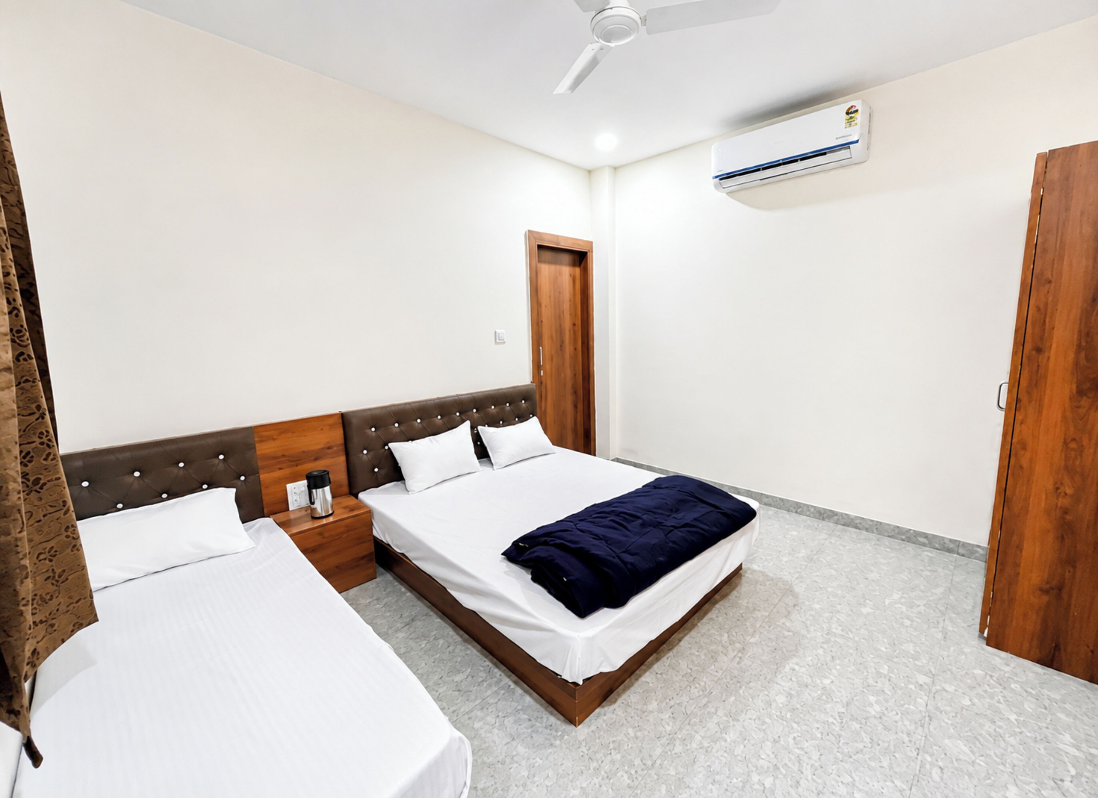 Chambre Triple Deluxe, climatisation | Vue de la chambre