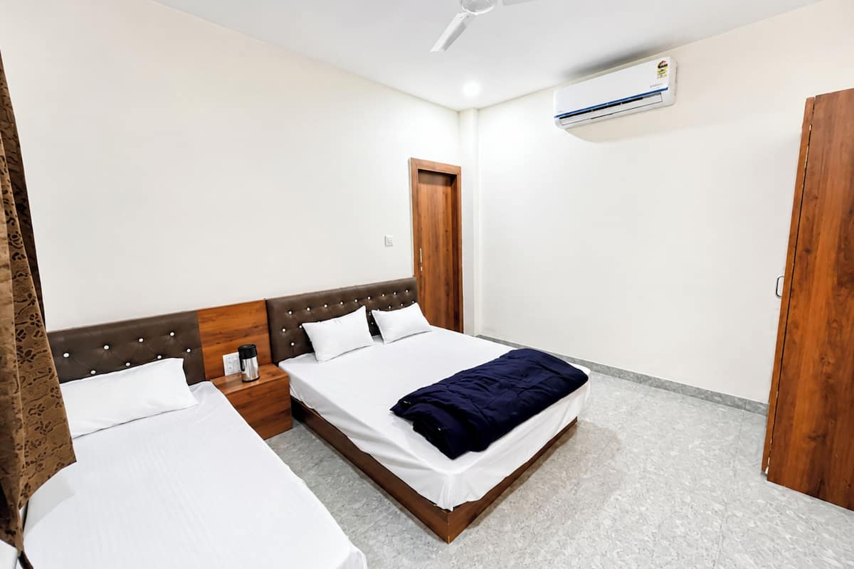 Chambre Triple Deluxe, climatisation | Vue de la chambre