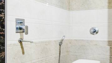 Shower, towels, shampoo, toilet paper