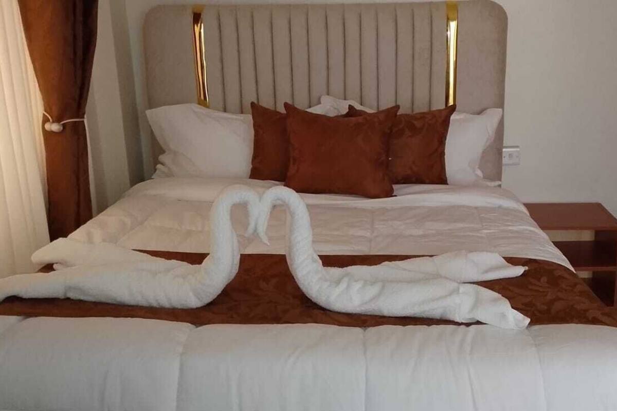 Superior Suite, City View | Desk, laptop workspace, blackout drapes, WiFi (free)