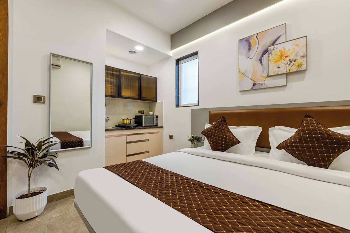 Habitación Deluxe | Caja fuerte y ropa de cama