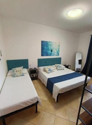 Room - Siceliota House – Spacious Family Apartment with 2 Bedrooms, a Terrace, and Parking (Marinella)