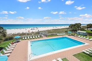 A pool area with a view of the beach and ocean. - Sunswept 304 by Liquid Life (Orange Beach)