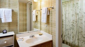 A bathroom with a sink, mirror, and towel rack. - Seaside Beach & Racquet 5915 by Liquid Life (Orange Beach)