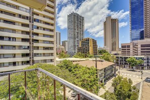 A multi-story building with balconies and a clear sky. - Waikiki Penthouse, 1 Free Parking, 3bdrm, Sleeps 6 (Honolulu)