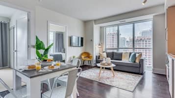 Luxury Condo, 3 Bedrooms, City View | Living area | Smart TV, Netflix, streaming services