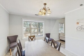 Dining - Well-appointed home with spacious backyard, firepit, streaming, & central AC (Savannah)