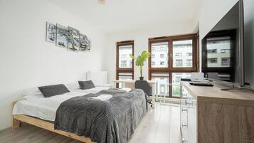 Apartment, Balcony, City View | Iron/ironing board, free WiFi