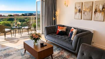 Superior Apartment, 2 Bedrooms, Balcony, Sea View | Living area | 65-inch Smart TV with digital channels