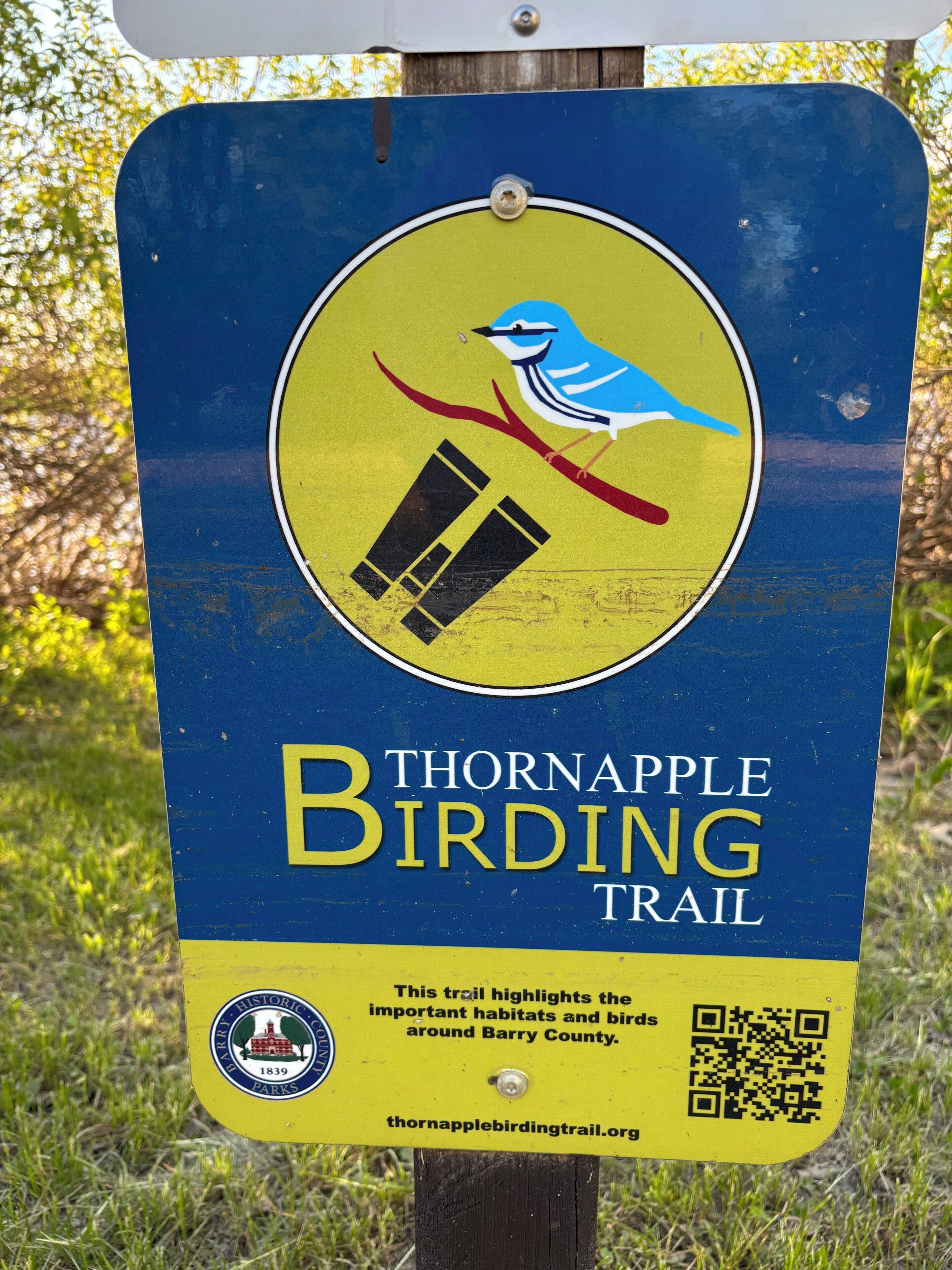 A sign for the Thornapple Birding Trail with a QR code and a logo for Barry Historic Parks.