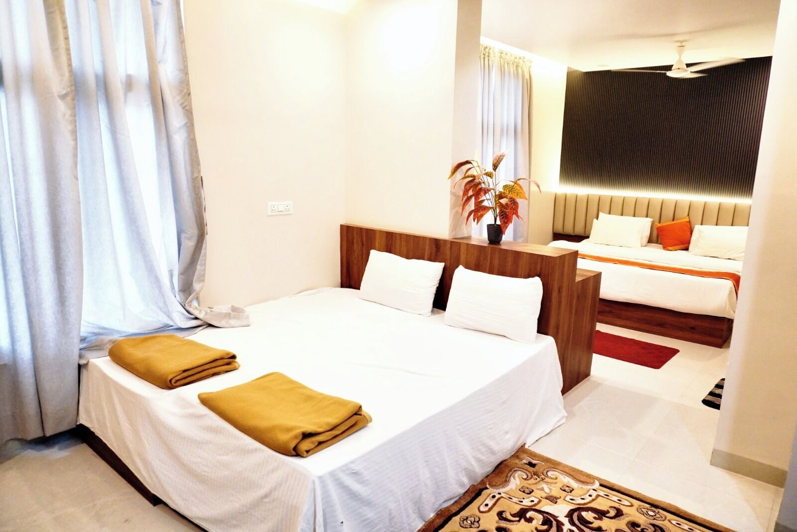 Habitación Deluxe con 2 camas individuales, vistas a la ciudad | Ropa de cama