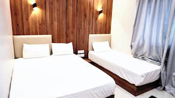 Habitación Deluxe doble | Ropa de cama