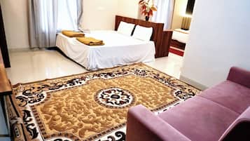 Family Room, City View | Bed sheets