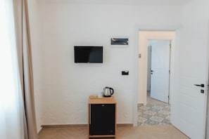 Habitación doble superior, vista al jardín | Interior