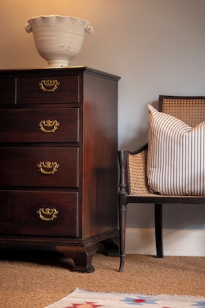 A wooden dresser with gold handles and a white bowl on top. - Drumsheugh Garden House (Edinburgh)
