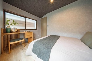 A bedroom with a bed, a desk, a chair, a window, and a door. - Designer-designed, accommodate 6 people / 8 minutes from Shinjuku and Shibuya. (Setagaya City)
