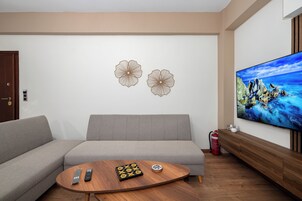 Apartamento Confort, balcón | Zona de estar