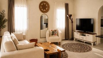 Family Room, Balcony, City View | WiFi (free), bed sheets