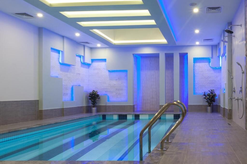 Indoor pool, seasonal outdoor pool, pool umbrellas, sun loungers
