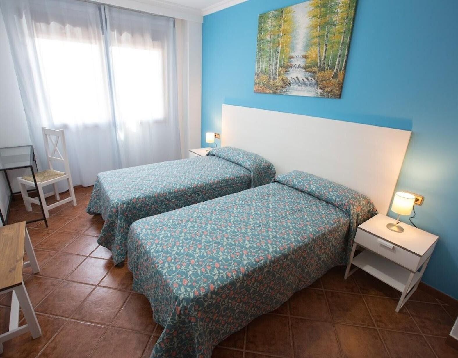 11 dormitorios, tabla de planchar con plancha, wifi y ropa de cama