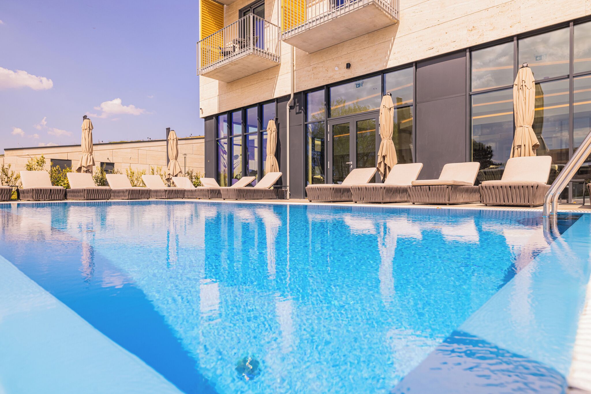 Seasonal outdoor pool, pool loungers