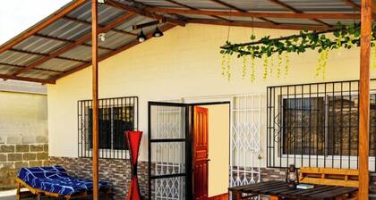 A Cozy and Safe 4-Bedroom House, Near the Local Beach.