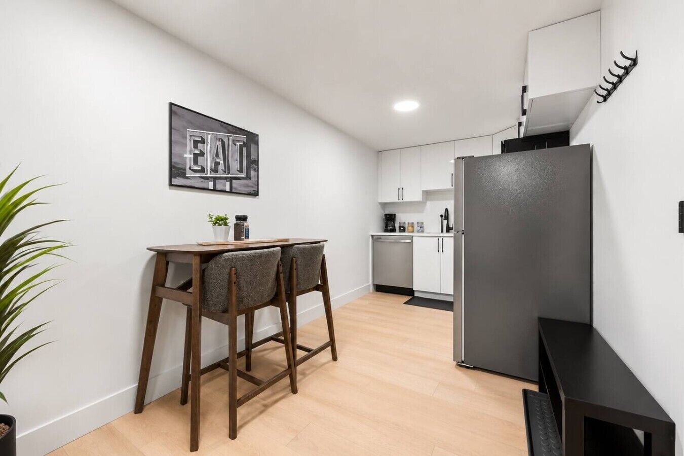 Coffee/tea maker, fridge, stovetop, dishwasher