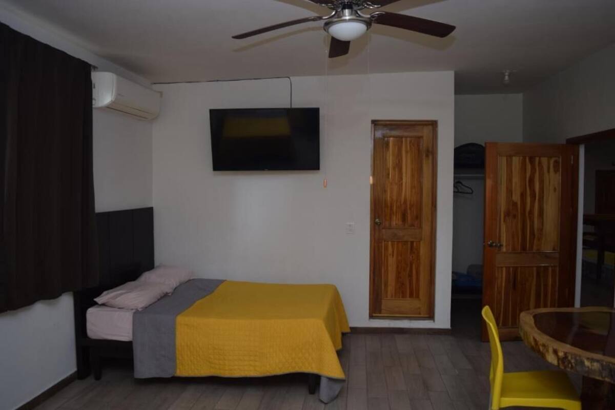 Habitación triple Confort, vista al jardín | Wifi gratis 