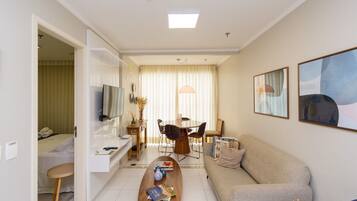 Basic Apartment | Living area | 40-inch TV with digital channels
