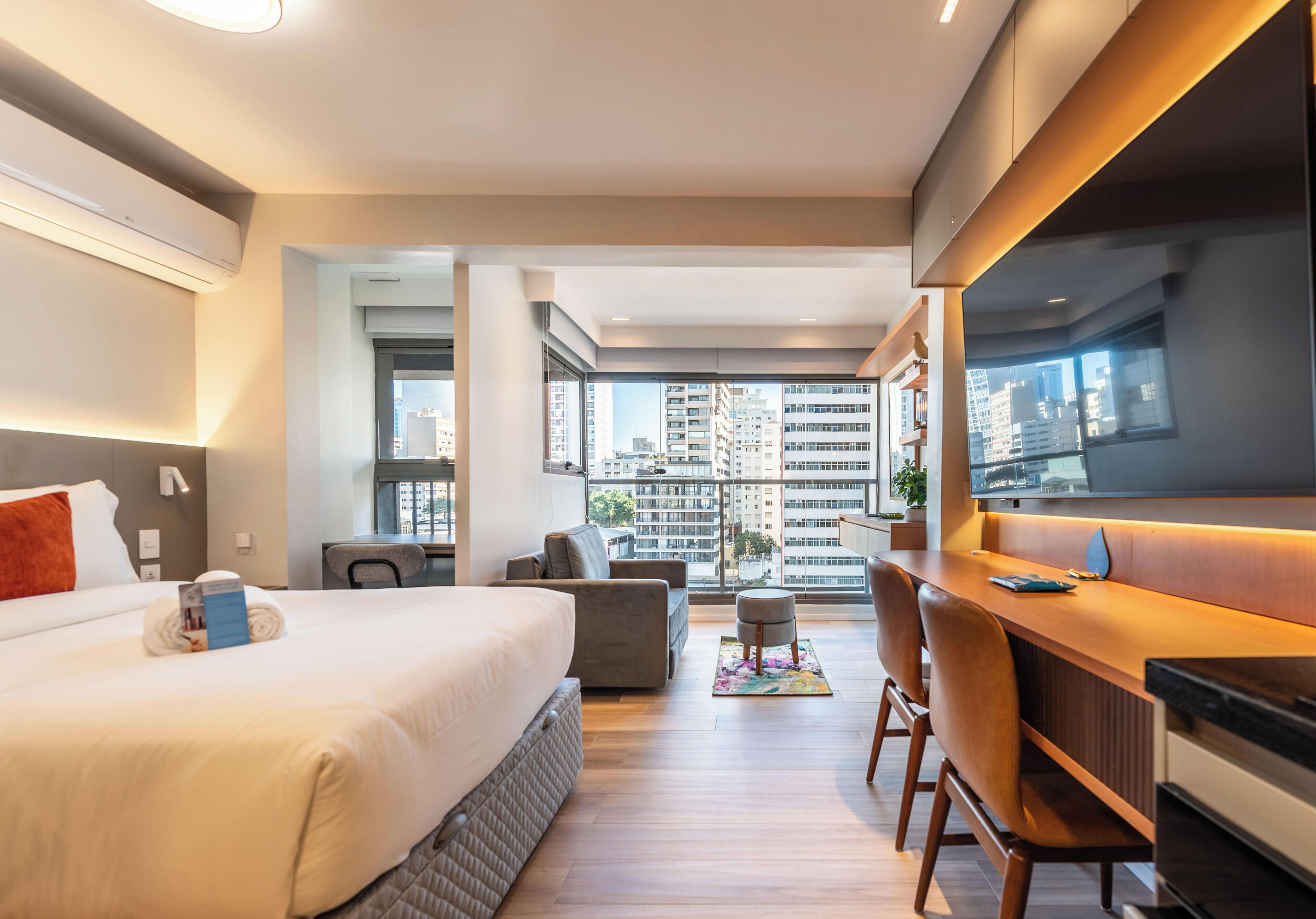 Deluxe Studio, City View | Blackout curtains, free WiFi