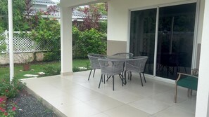 Outdoor dining - 3BR/2Bathroom AC, Pool, Beach club,Private Garden with Terrace and ,Pizza Oven. (Vacamonte)