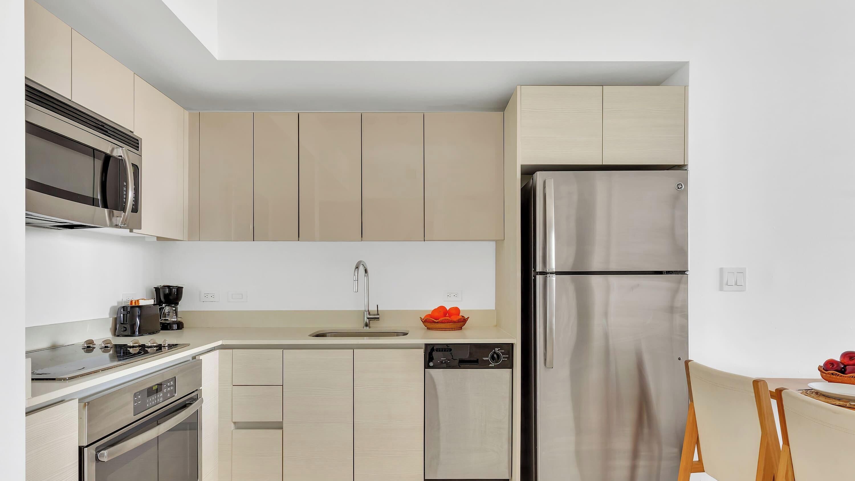 Coffee/tea maker, fridge, microwave, oven