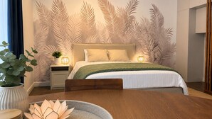 A modern bedroom with a bed, bedside tables, a nightstand, a potted plant, and a decorative wall. - Sunlay City (Rīga)