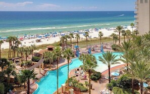 A resort with a pool, beach, and ocean view. - Shores of Panama 721~Sleeps 8 (Panama City Beach)