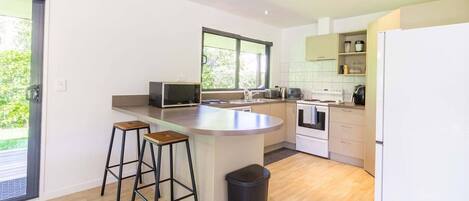 Coffee/tea maker, fridge, microwave, oven