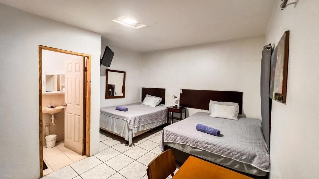 Desk, blackout curtains, iron/ironing board (on request), free WiFi