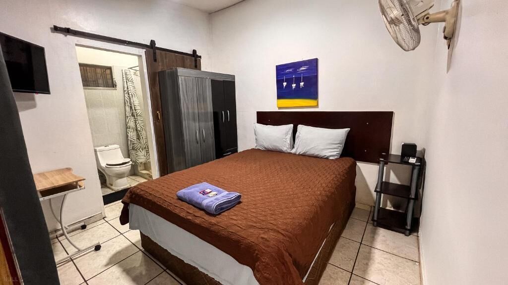 Standard Quadruple Room, Patio, Courtyard View | Desk, blackout curtains, iron/ironing board (on request), free WiFi