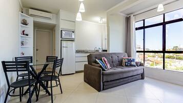Basic Apartment | Living area | 40-inch TV with digital channels
