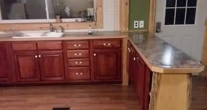 Peaceful 2-bedroom Private Cabin on 1 Acre with Hot Tub.