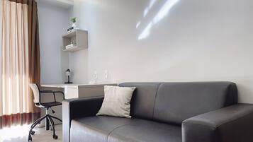 Departamento básico | Área de sala de estar | Televisión de 40 pulgadas con canales digitales
