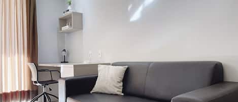 Departamento básico | Área de sala de estar | Televisión de 40 pulgadas con canales digitales