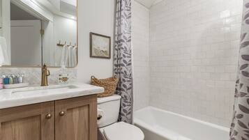 Hair dryer, towels, soap, toilet paper