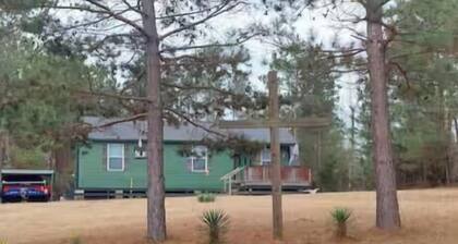 Relax in the woods in this quaint 3-bedroom house with a pool in Kennard.
